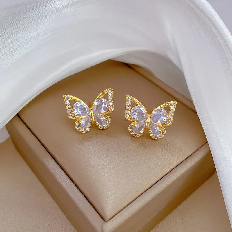 "Luxe Steel Butterfly Glow Set – Clear Gem Earrings & Pendant for Her"