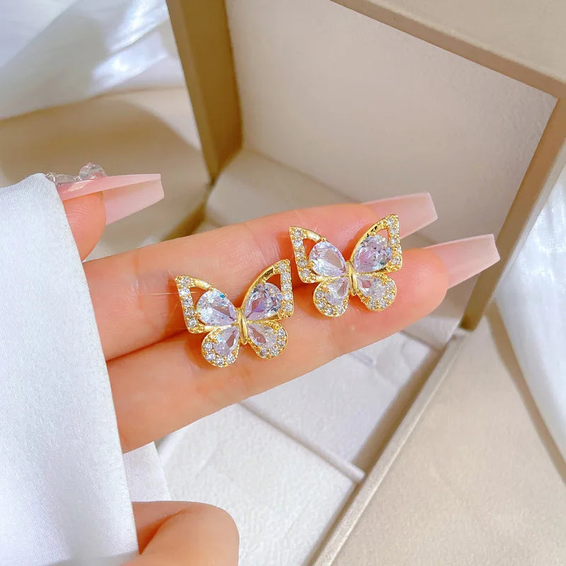 "Luxe Steel Butterfly Glow Set – Clear Gem Earrings & Pendant for Her"