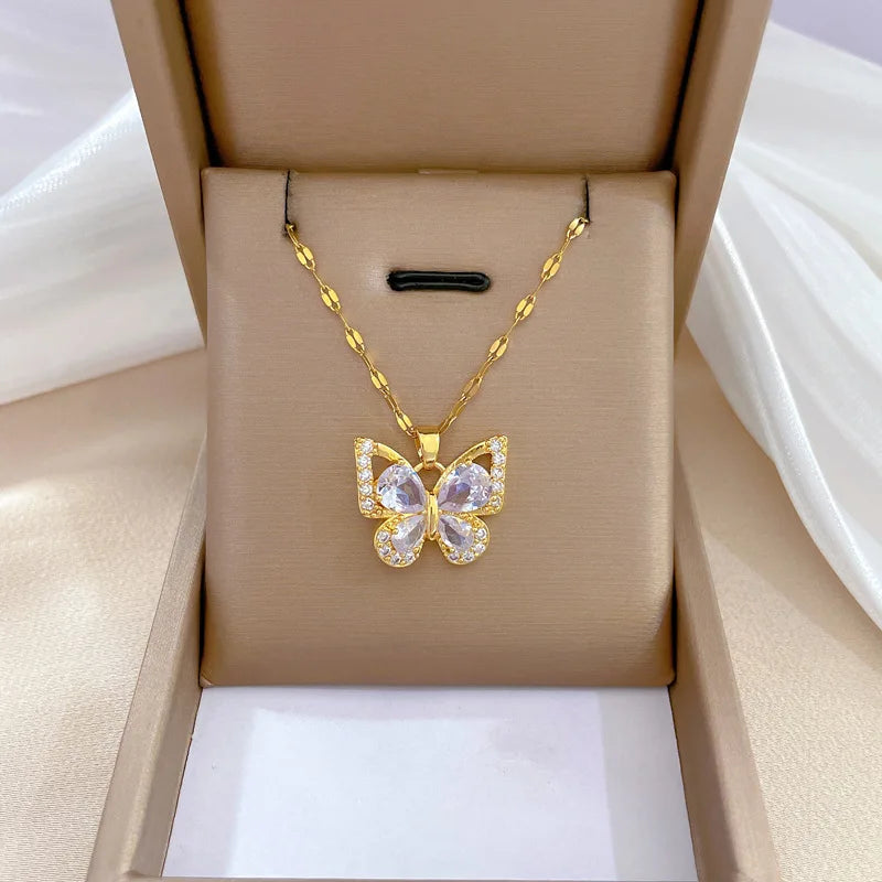 "Luxe Steel Butterfly Glow Set – Clear Gem Earrings & Pendant for Her"