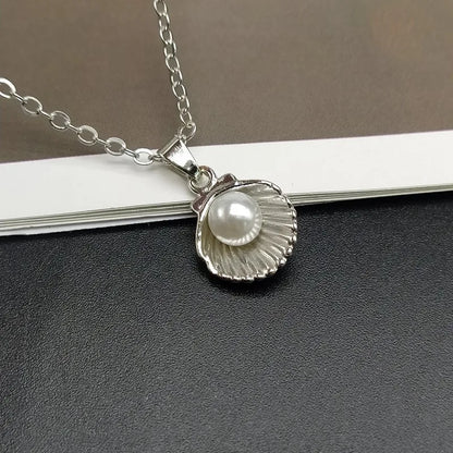 Seabloom Pearl Charm Necklace – Coastal Shell-Inspired Summer Layer