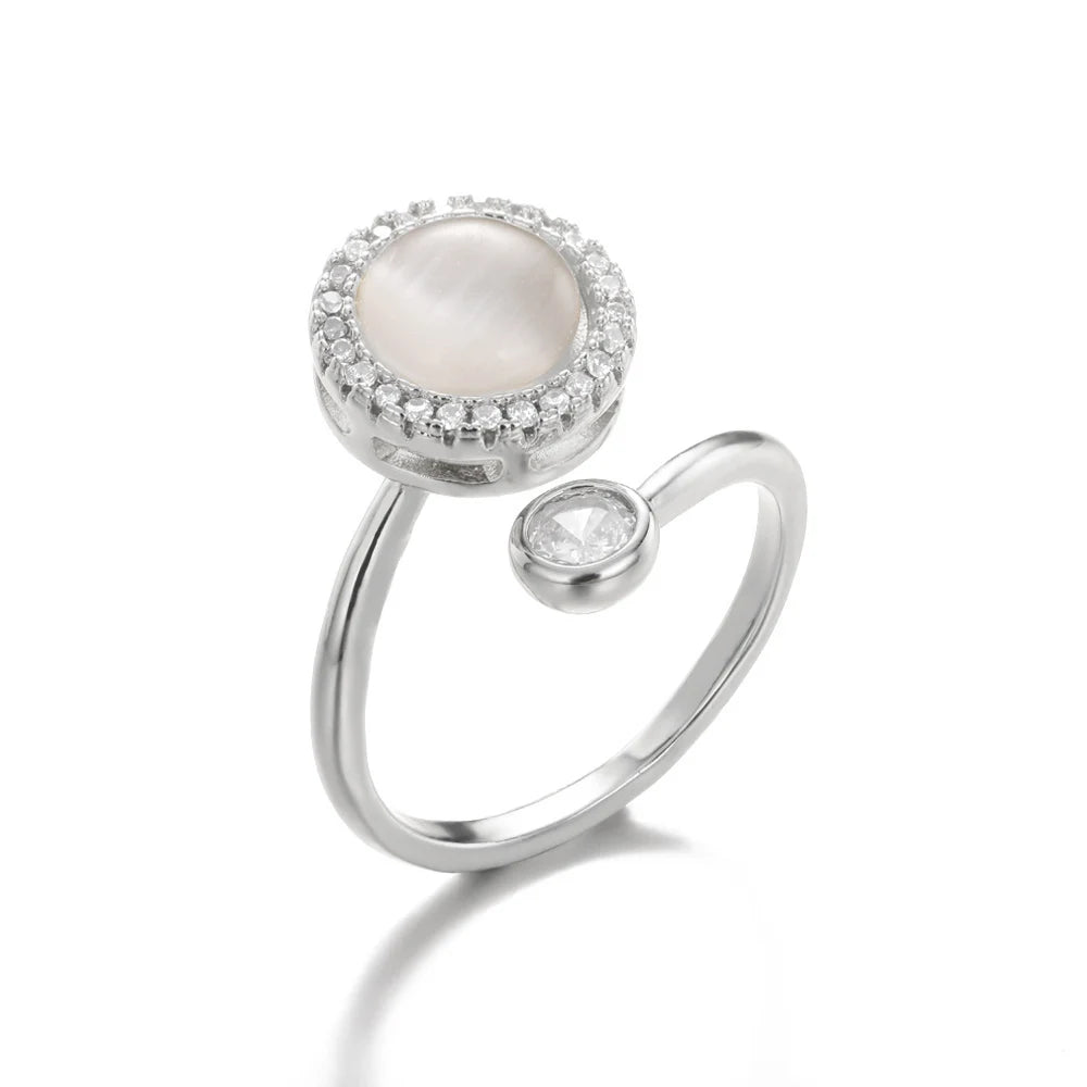 "TwirlCharm Clover Spinner Ring – Anti-Stress Steel Fidget Jewelry with Zircon Sparkle"