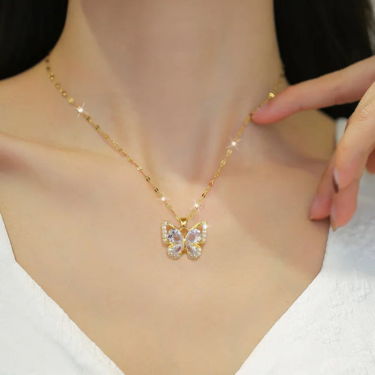"Luxe Steel Butterfly Glow Set – Clear Gem Earrings & Pendant for Her"