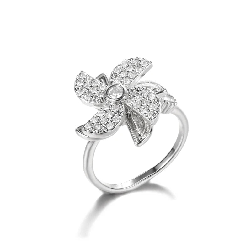 "TwirlCharm Clover Spinner Ring – Anti-Stress Steel Fidget Jewelry with Zircon Sparkle"
