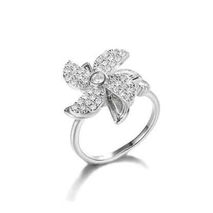 "TwirlCharm Clover Spinner Ring – Anti-Stress Steel Fidget Jewelry with Zircon Sparkle"
