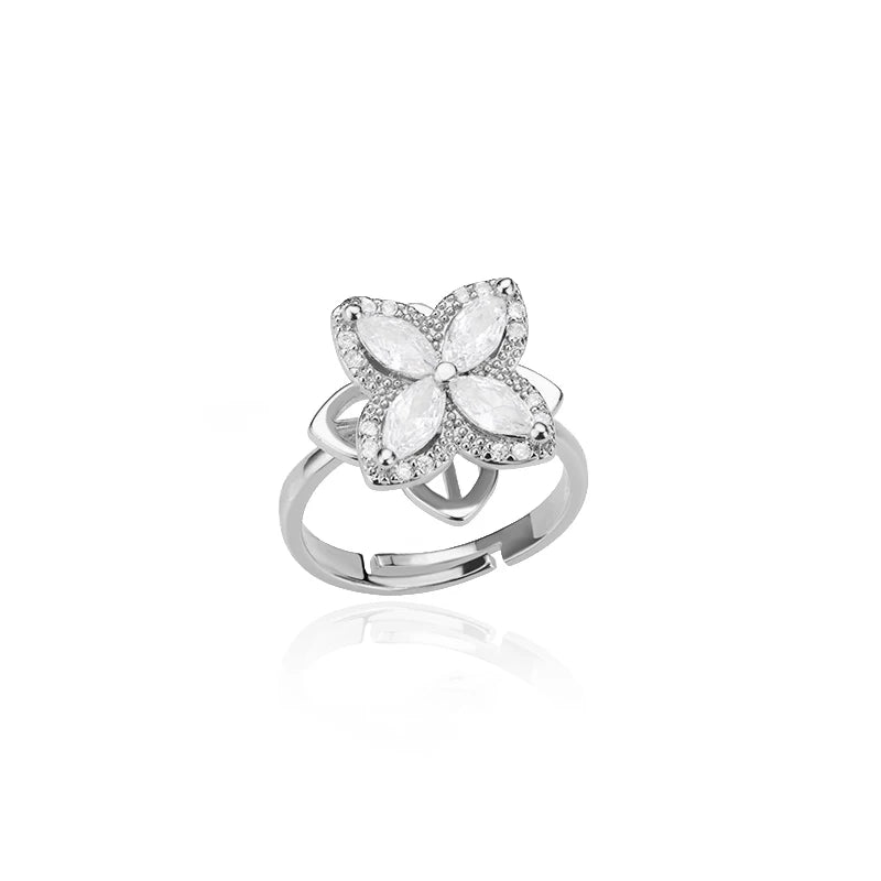 "TwirlCharm Clover Spinner Ring – Anti-Stress Steel Fidget Jewelry with Zircon Sparkle"