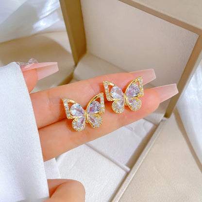 "Luxe Steel Butterfly Glow Set – Clear Gem Earrings & Pendant for Her"