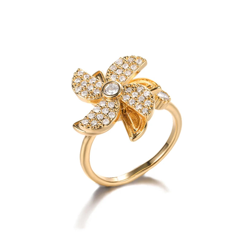 "TwirlCharm Clover Spinner Ring – Anti-Stress Steel Fidget Jewelry with Zircon Sparkle"